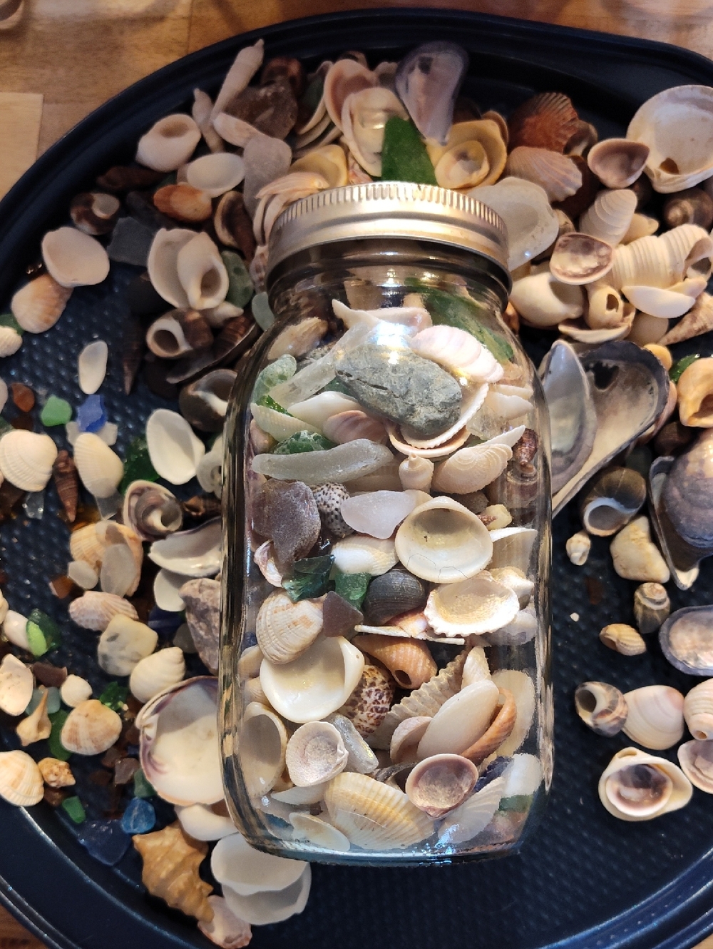 Mason Jar Full Of A Collection Of Sea Shells And Sea Glass With Plenty More